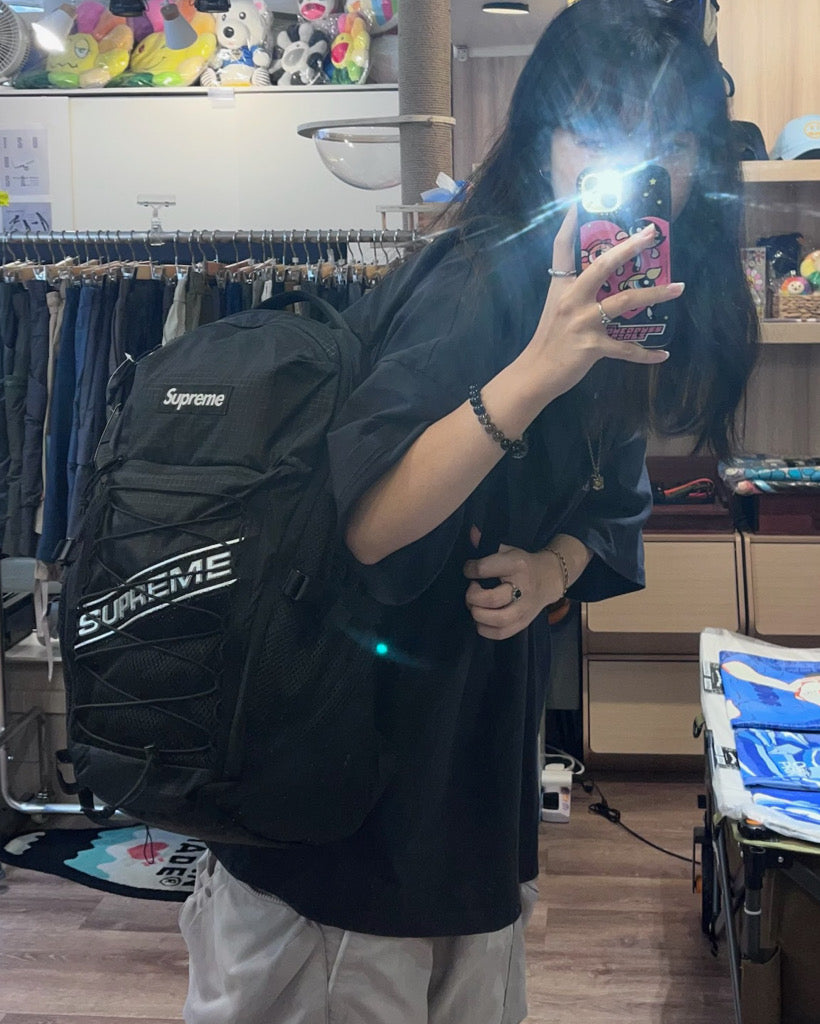 Supreme deals backpack girl